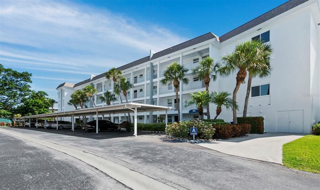 The midrise building sits right on Sarasota Bay and offers a covered parking space