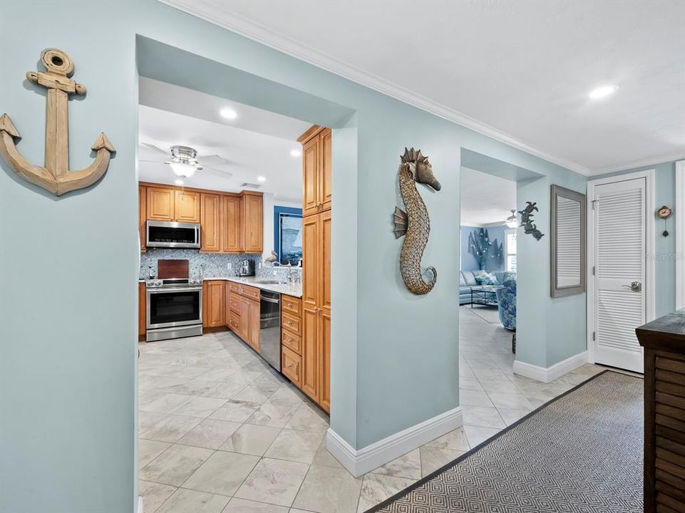 The stunning renovated kitchen is open to the light filled living and dining area