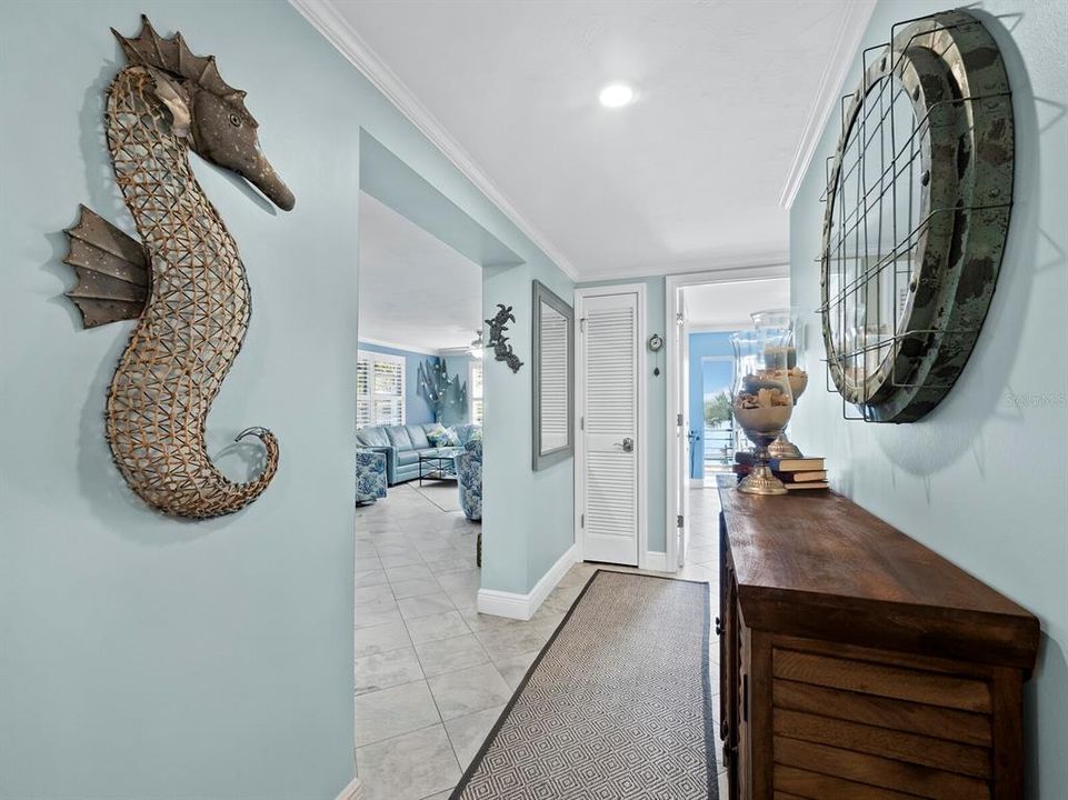 Enter in to a beautiful foyer, meticulously maintained and painted in seaside hues