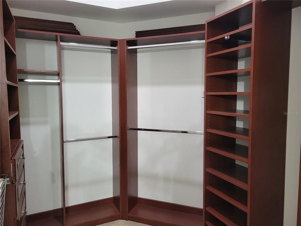 CUSTOM BUILT IN MASTER CLOSET