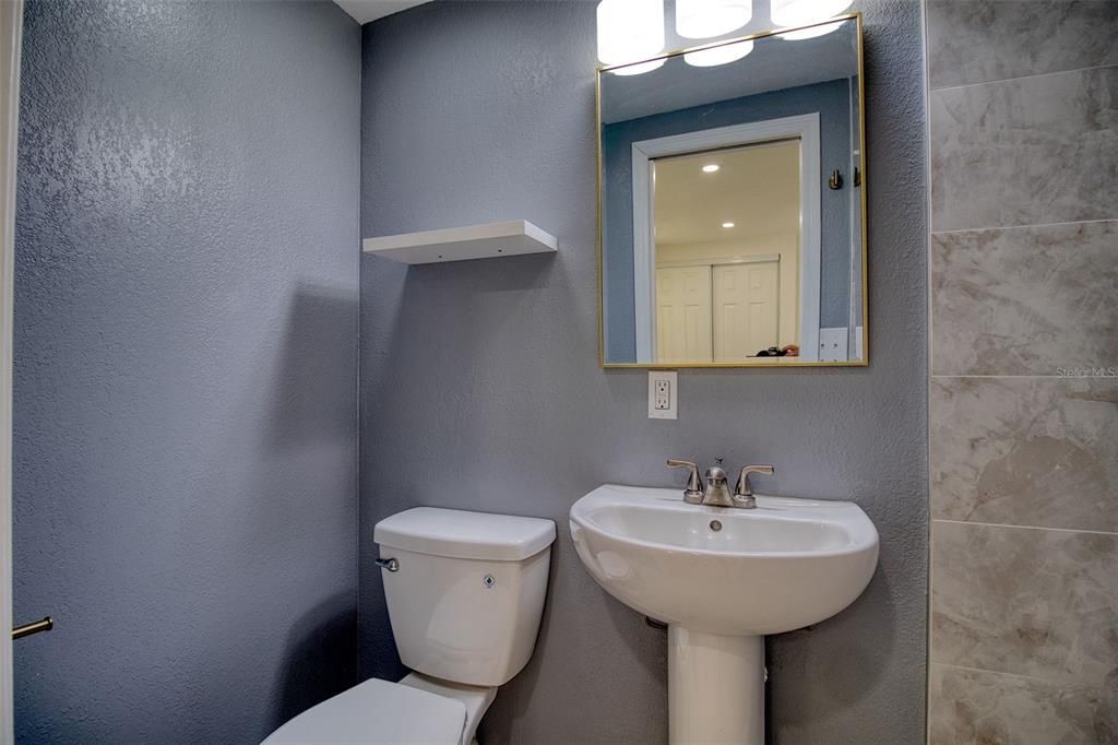 Primary bathroom with shower and no tub