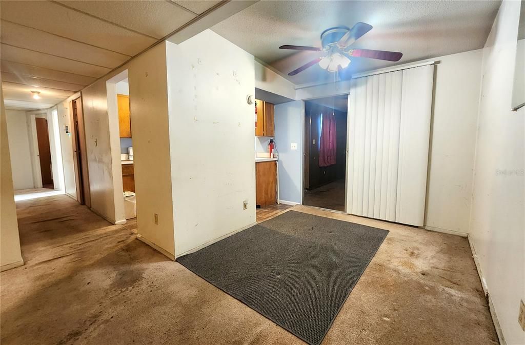 Dining room. Bedrooms down hall on left. Florida room to right of kitchen.