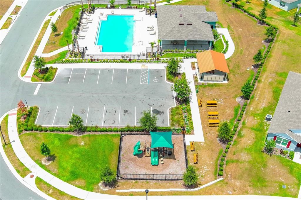 AERIAL VIEW OF COMMUNITY POOL AND PLAYGROUND