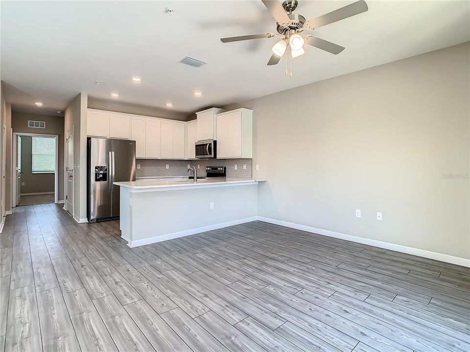 Main living space with vinyl flooring