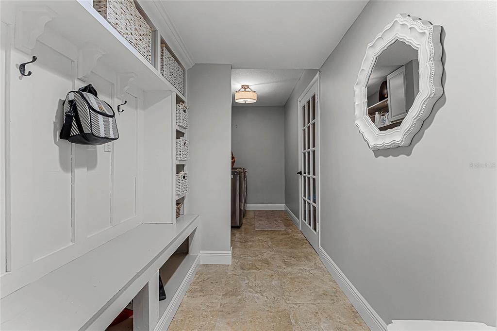 Mud room ( laundry , off garage , and kitchen with built in storage)