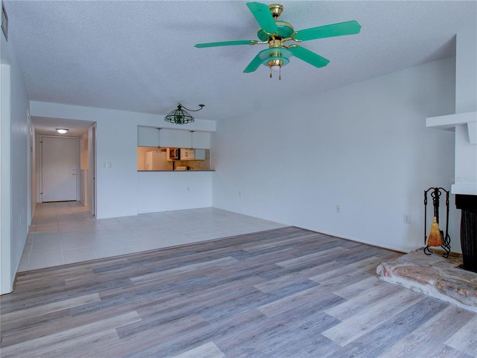 Living room and dining area looking at the breakfast bar