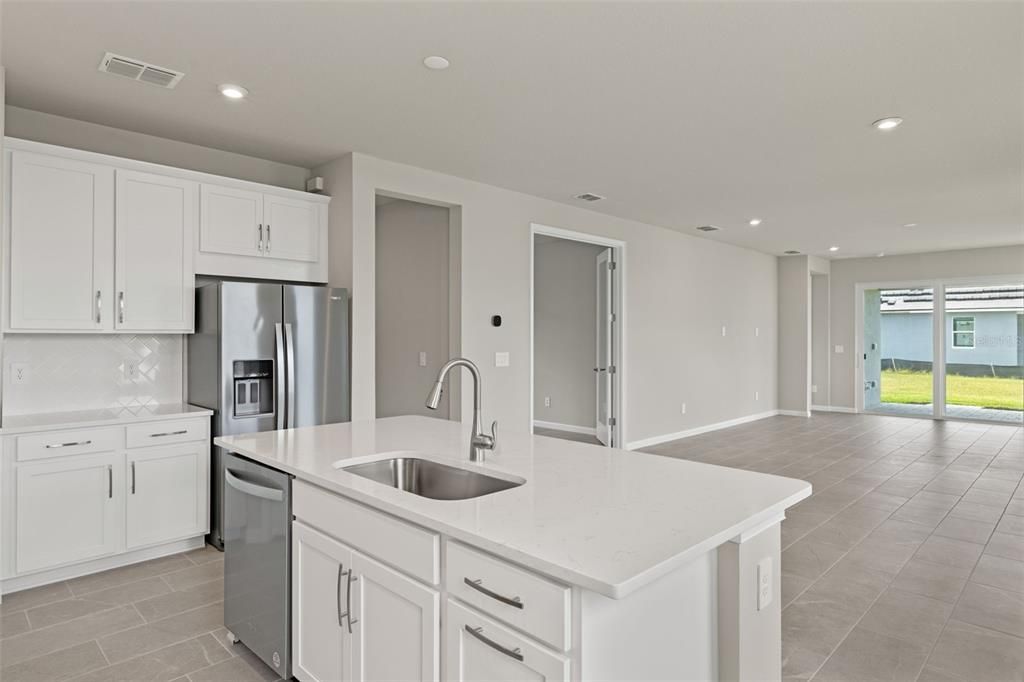 Model Great Room View of Kitchen and Dining