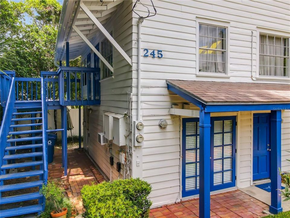 Front view with stairs to 2nd unit