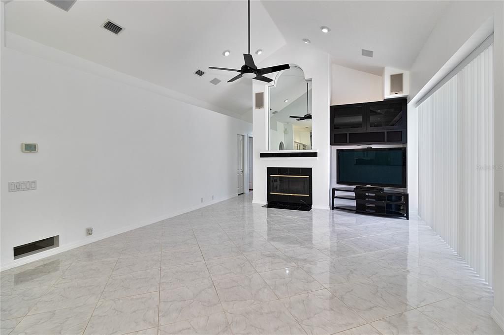 GREAT ROOM WITH FIREPLACE AND VAULTED CEILINGS