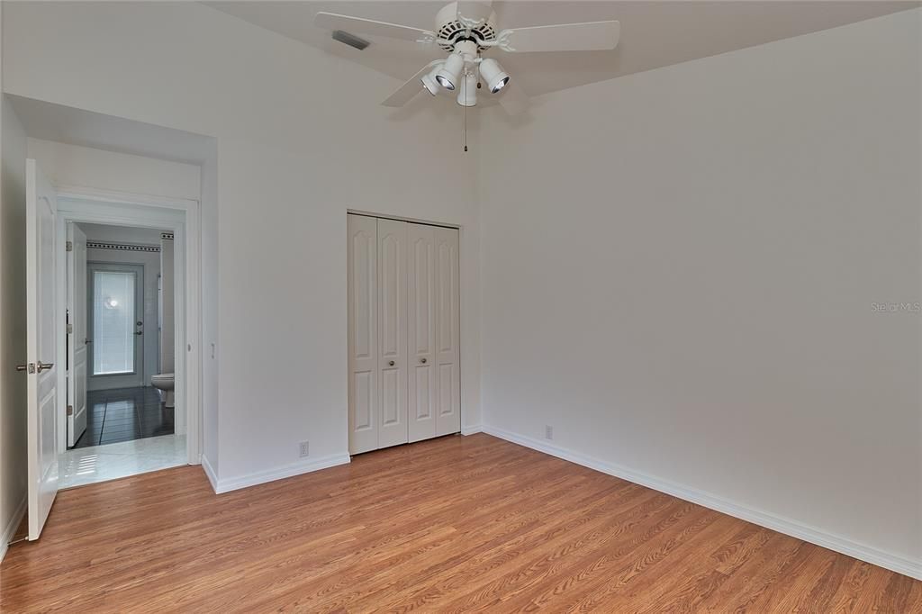 BEDROOM NEAR POOL BATH ENTRANCE