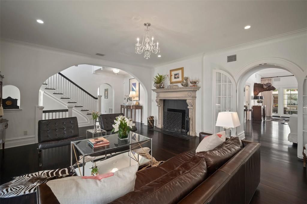 CUSTOM CARVED ORIGINAL HEARTH GRACES THE SPACE