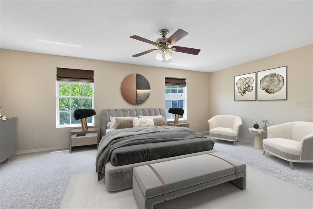 This photo has been virtually staged. Retreat to the expansive master bedroom featuring a walk-in closet and an en suite bathroom with a shower.