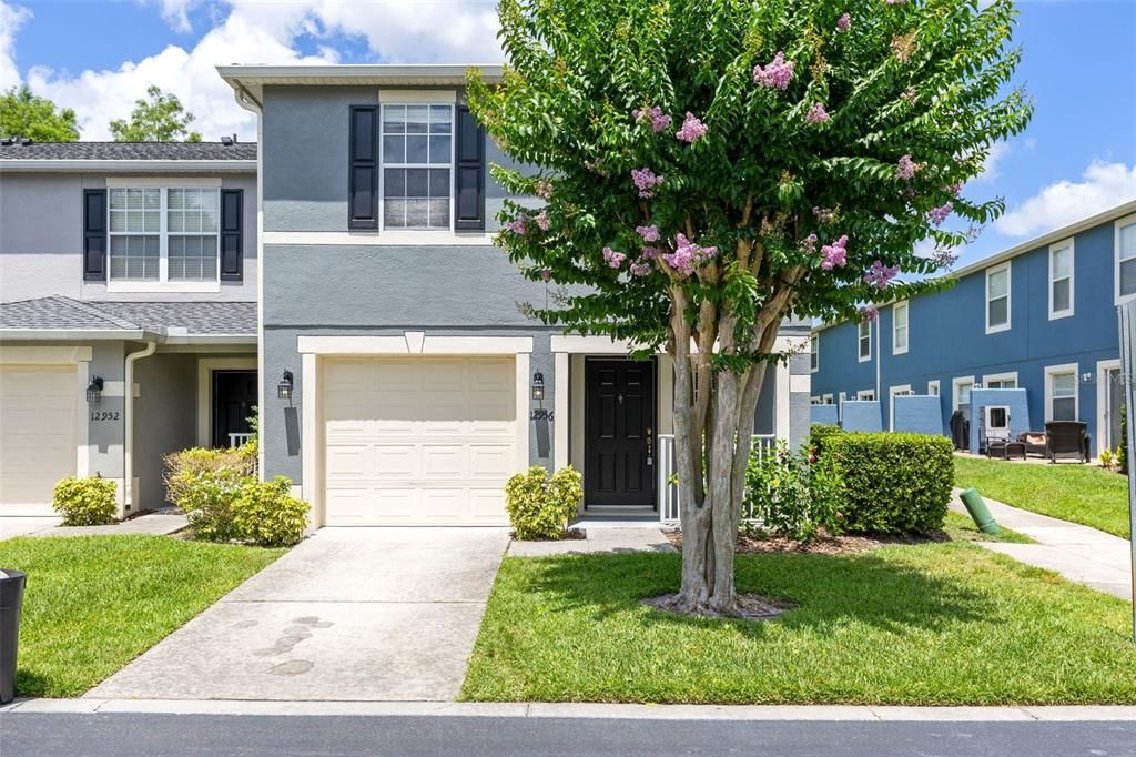 Welcome to your dream townhouse nestled in the heart of a beautiful east Orlando gated community!