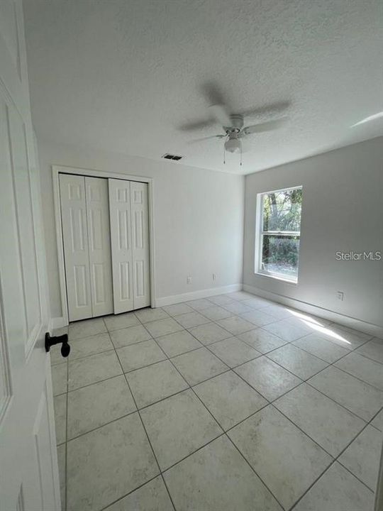 Bedroom # 3 with window to backyard