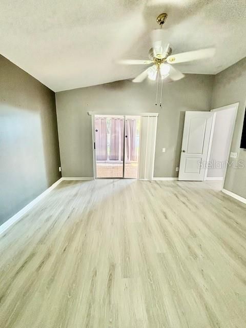 Master bedroom with slider door to rear porch/lanai