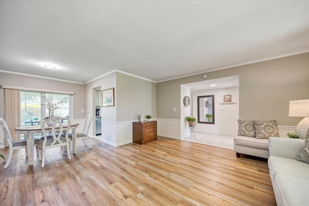 Living room opens to dining area for easy entertainment~