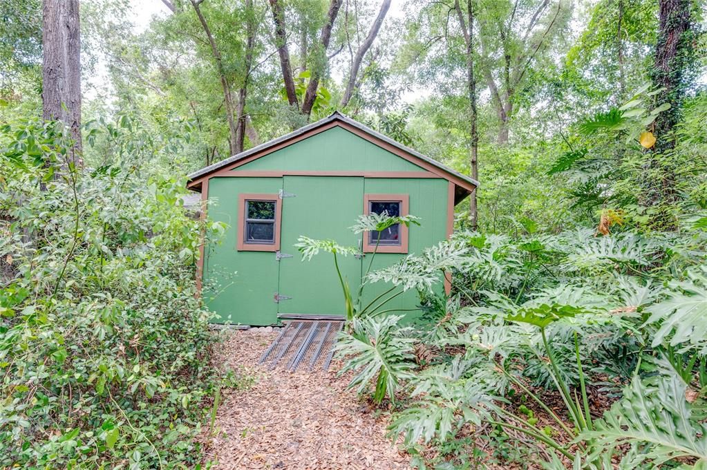 Shed (12'x12') - plenty of built-in shelving and recently repainted