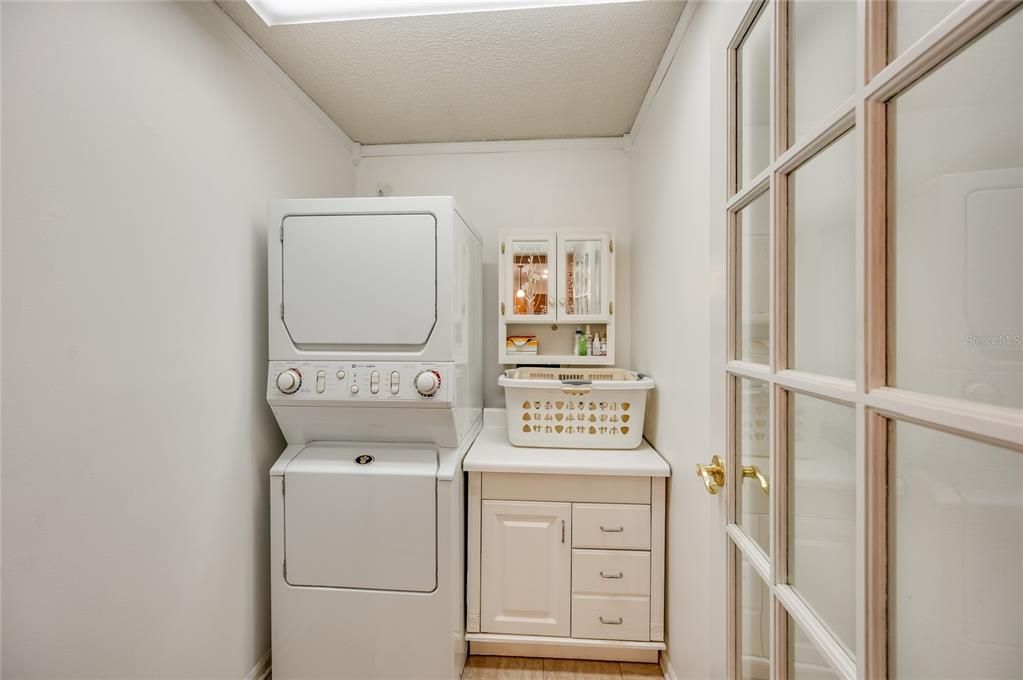 Inside laundry - countertop with storage is removable if side-by-side washer/dryer preferred (washer/dryer optional)