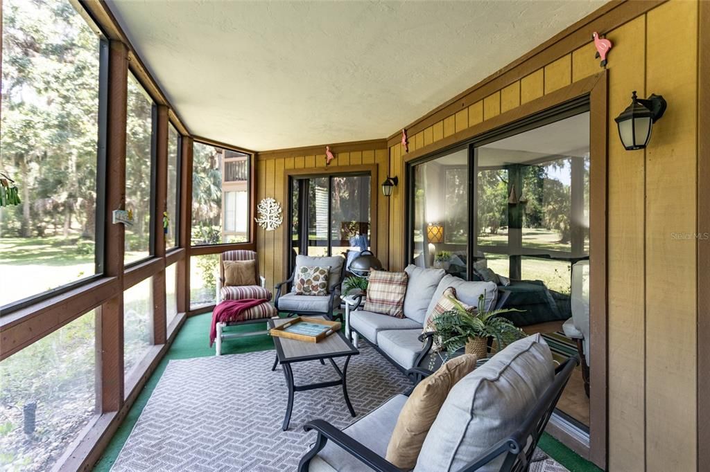 The Screened Furnished Patio Overlooks The Golf Course