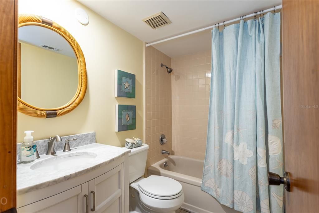 Guest Bathroom Shared By Both Guest Bedrooms Offers NEW Quartz Vanity