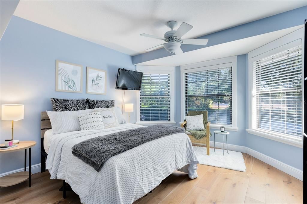 Upstairs bedroom has lots of bright, natural light and a walk-in closet.