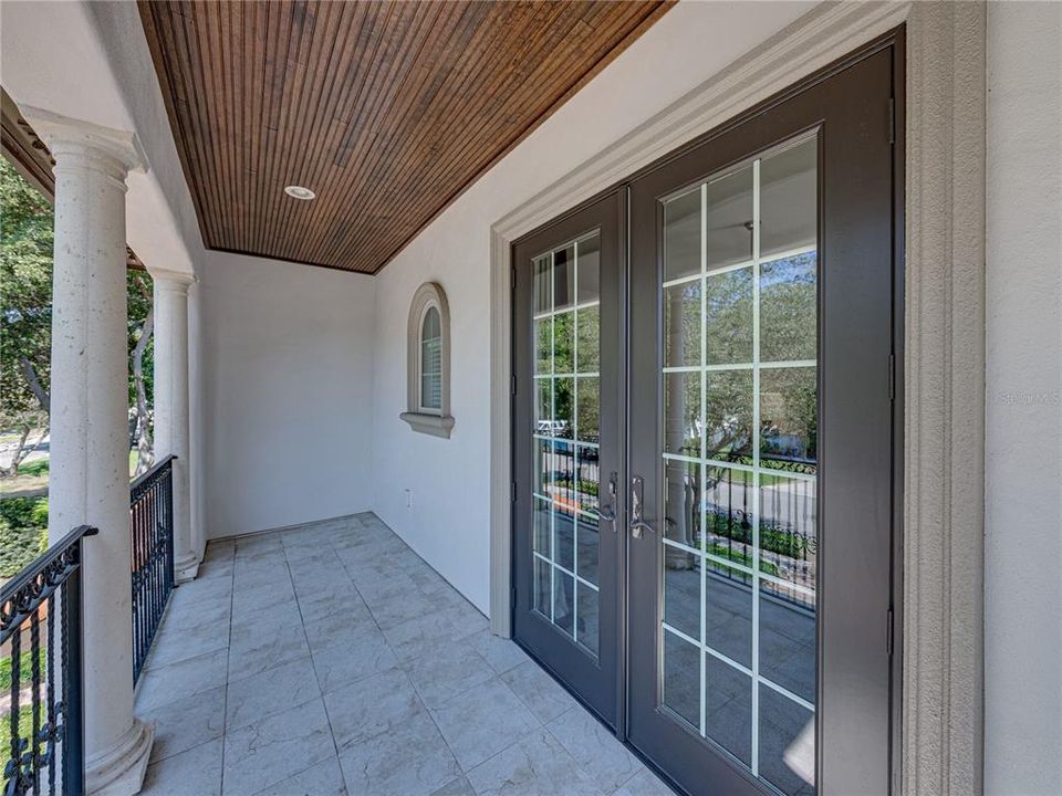 Bedroom 4 has front porch balcony