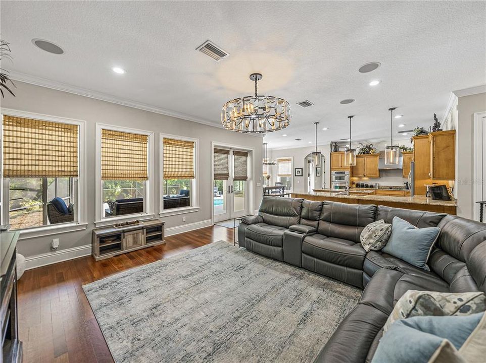 Family room with kitchen and back lanai in distance