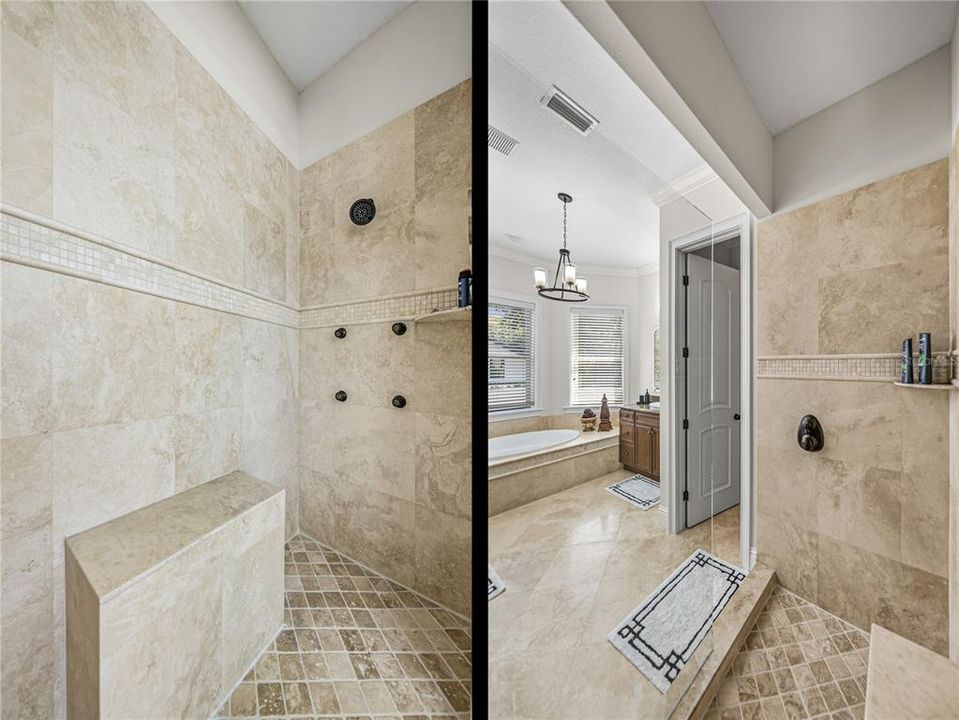 Primary bathroom features bench and multihead shower