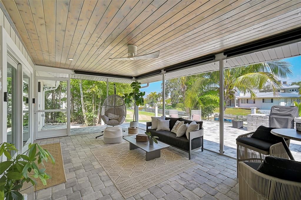 Delgatie Quartz Double Vanity. Rainfall Shower. Tropical Landscaping Views with Bright Natural Light. Large Window w Shutter