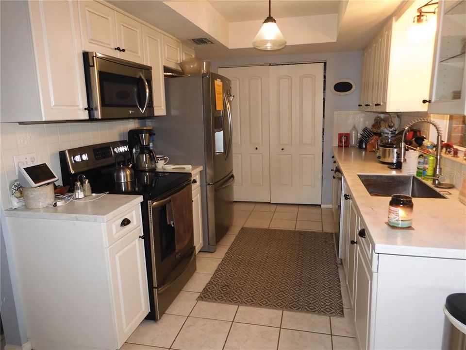 New stone countertops & large stainless sink in 2022.