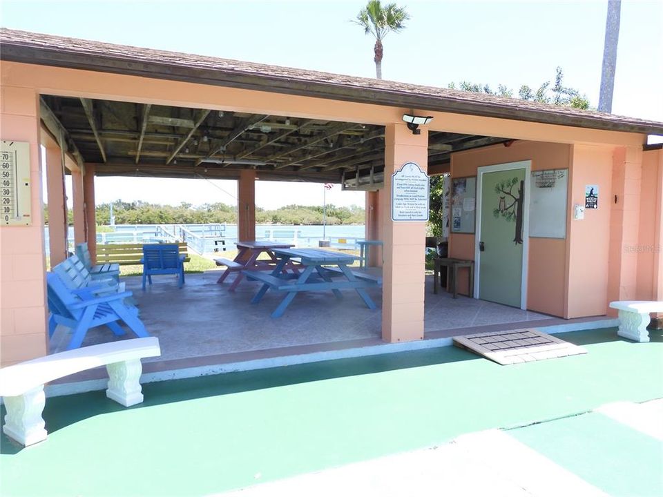 Riverfront cabana with picnic tables