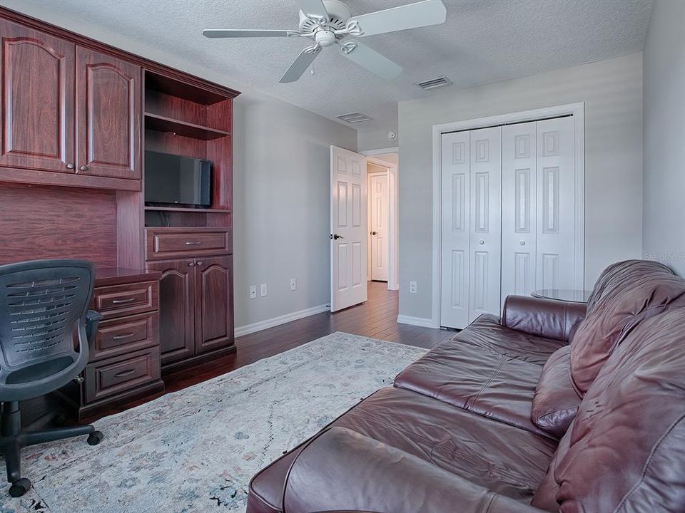 THE OFFICE FURNITURE IS BUILT-IN - ALL THE FURNITURE IN THIS ROOM INCLUDING THE RUG REMAINS WITH THE HOME.