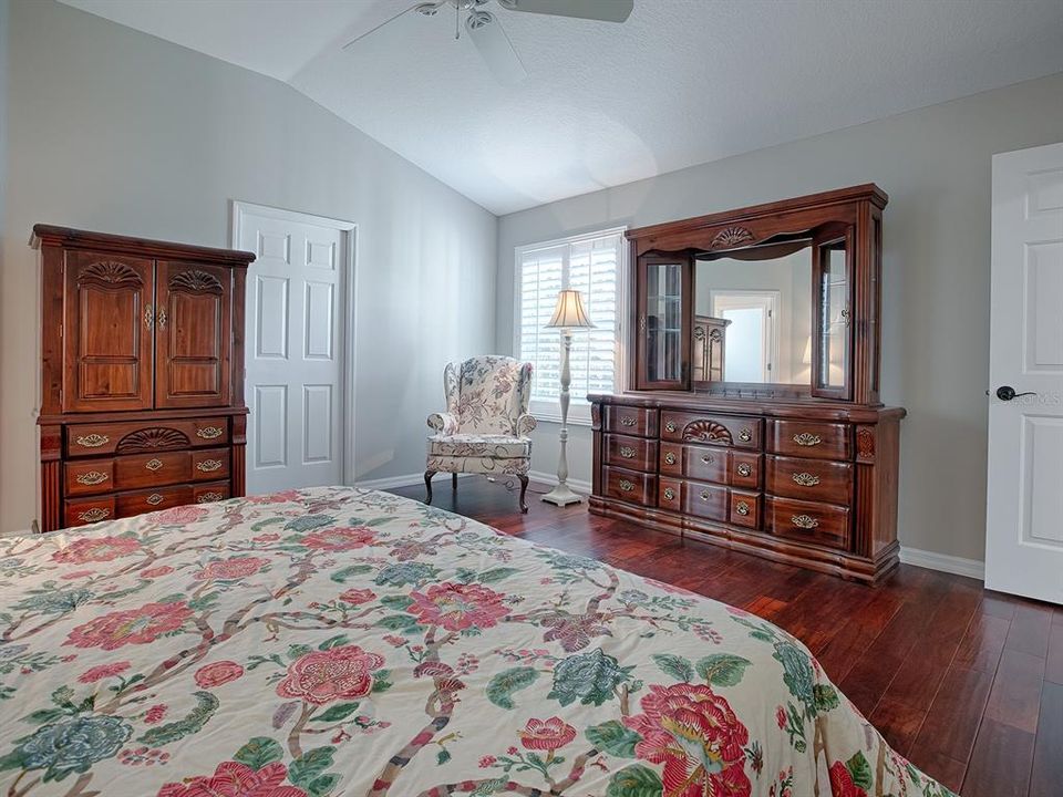 PLANTATION SHUTTERS AND VAULTED CEILING.