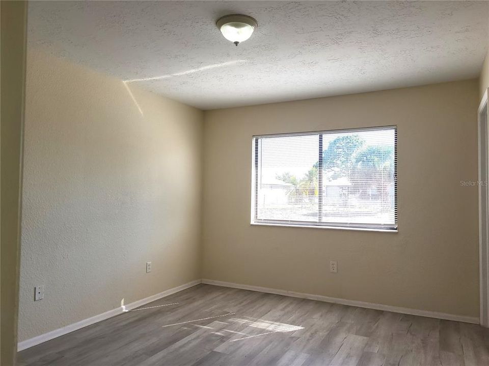 Master bedroom on the right off hallway.