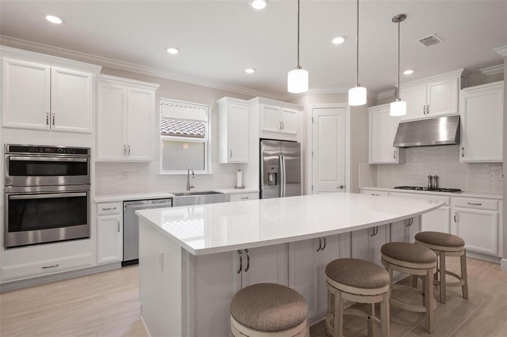This upgraded gourmet kitchen will be the envy of all of your chef friends!