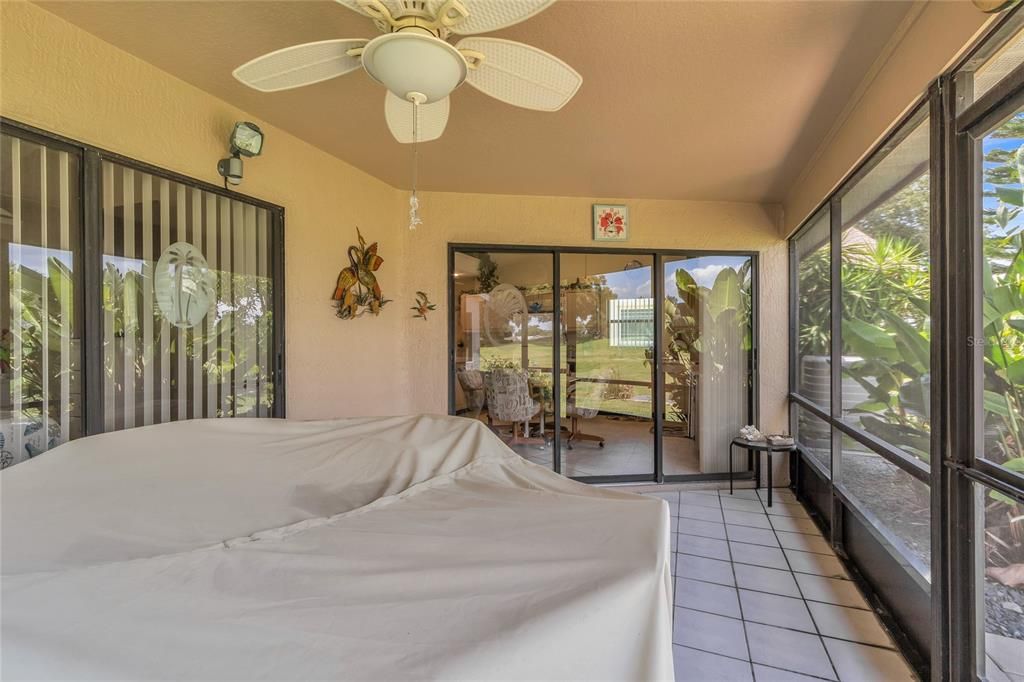 REAR SCREENED PATIO OVERLOOKING GOLF COURSE