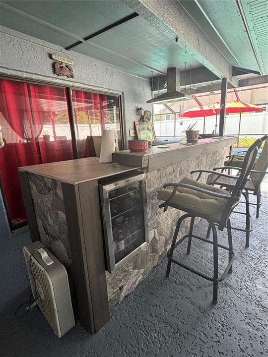 Outside bar with built in wine refrigerator