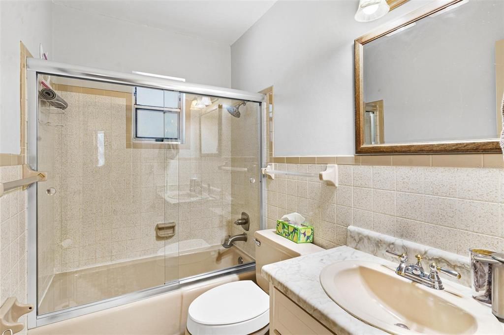 Primary Bathroom with Tub and Shower Combo