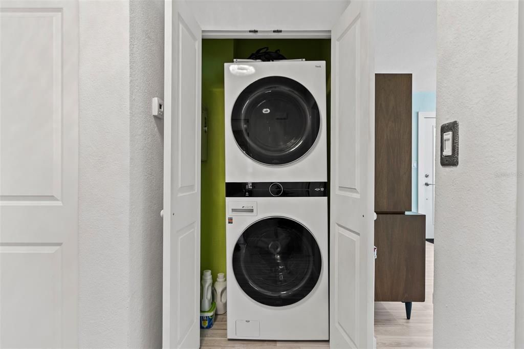 Laundry closet conveniently located in front of bedrooms