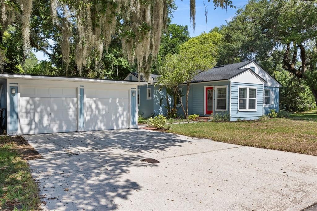 Detached two-car garage and back entrance.