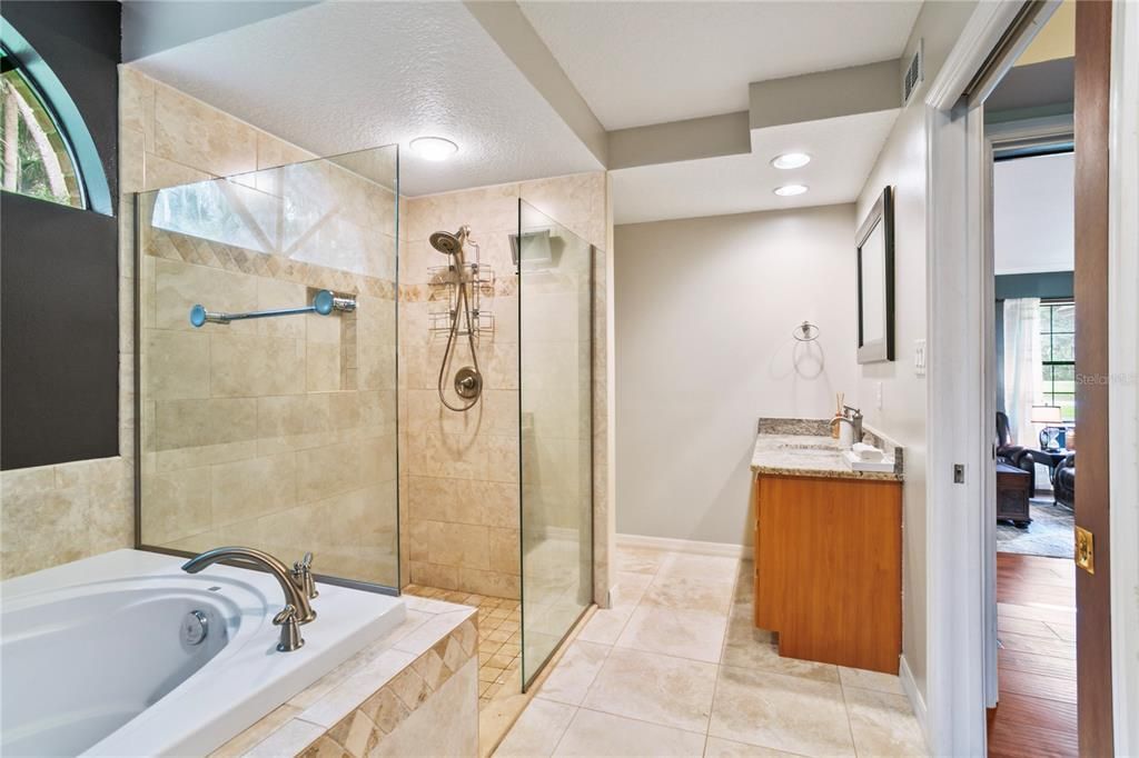 separate walk-in shower and large, garden tub