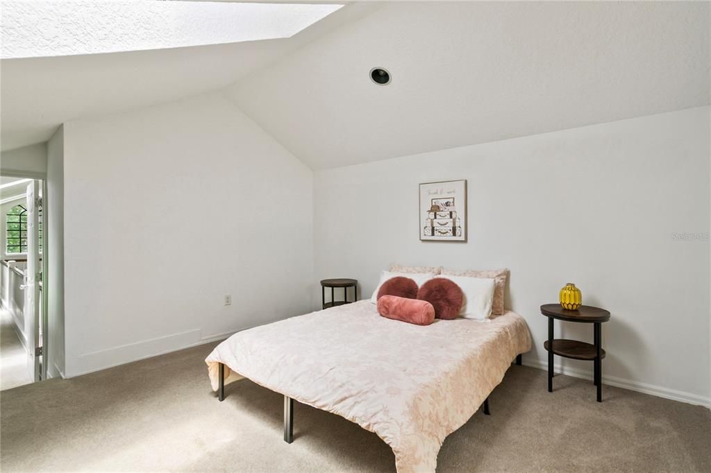 Catwalk connecting bedroom five to the large loft space overlooking the kitchen and family rooms downstairs