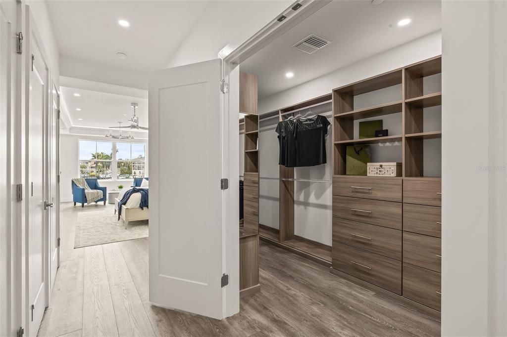 The primary suite offers ample closet space.