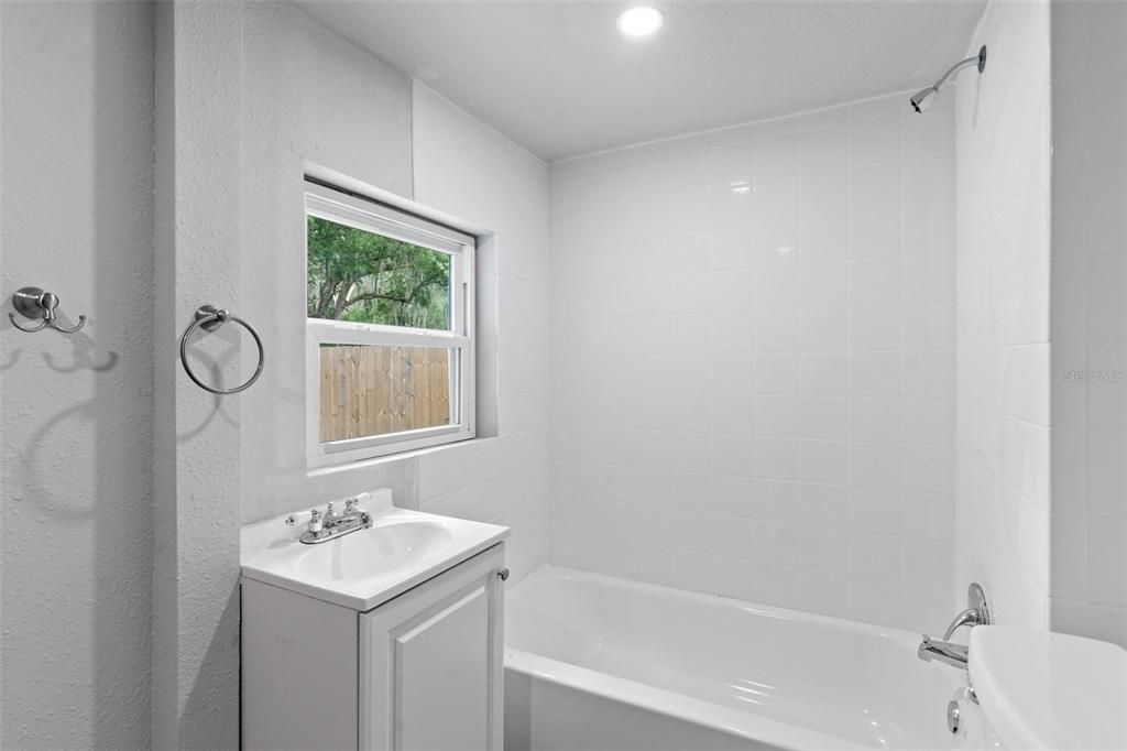 Main Bathroom with Tub and Shower