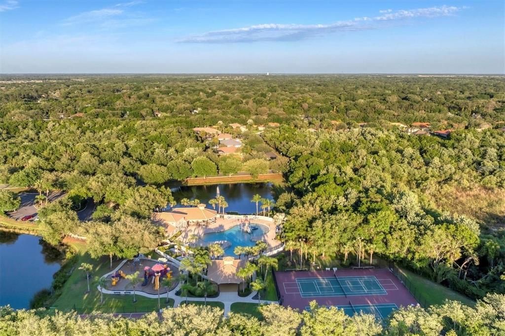 includes, Gated Community, Fitness Facility, Tennis, Pickleball, Basketball Courts, Playgrounds, Fishing, Baseball, Soccer Fields, 5 miles of Biking/Walking Paths, Two Community Heated year-round pools, Spas and Waterslide.