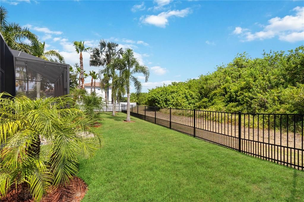 Florida inspired landscaping encompasses this home to always feel like you're living in paradise, a place to call home.