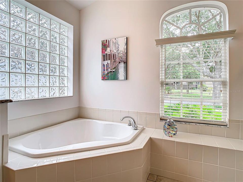 Primary bath with garden tub.