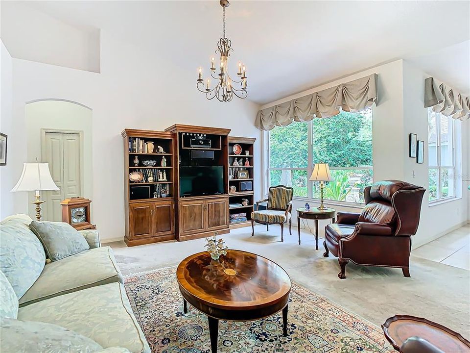 High ceilings and large windows in the family room give an air of space and light.