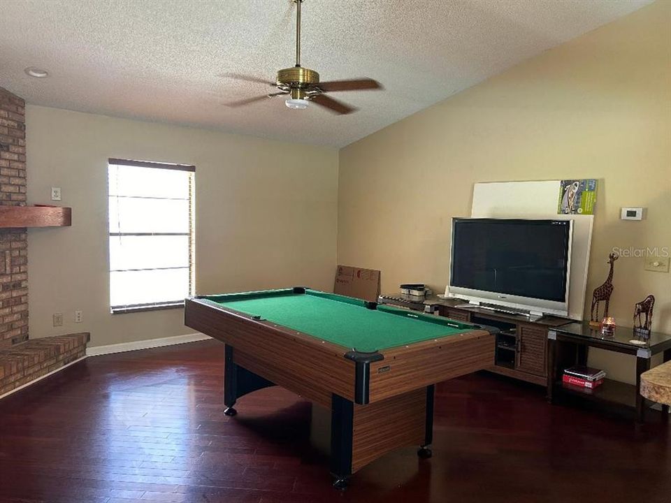 Fireplace and higher ceilings in family rm