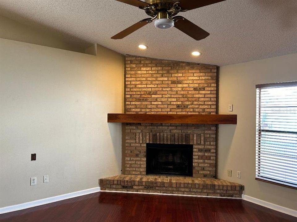 Fireplace and higher ceilings in family rm